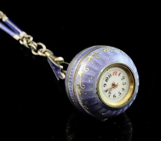 An early 20th century continental silver and blue guilloche enamel globe fob watch, chain 23in.